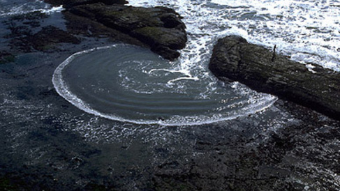 water wave through sea wall